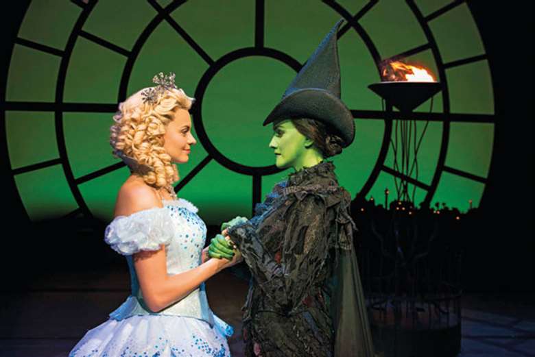  Left to right: Glinda (Sophie Evans) and Elphaba (Alice Fearn) in Wicked